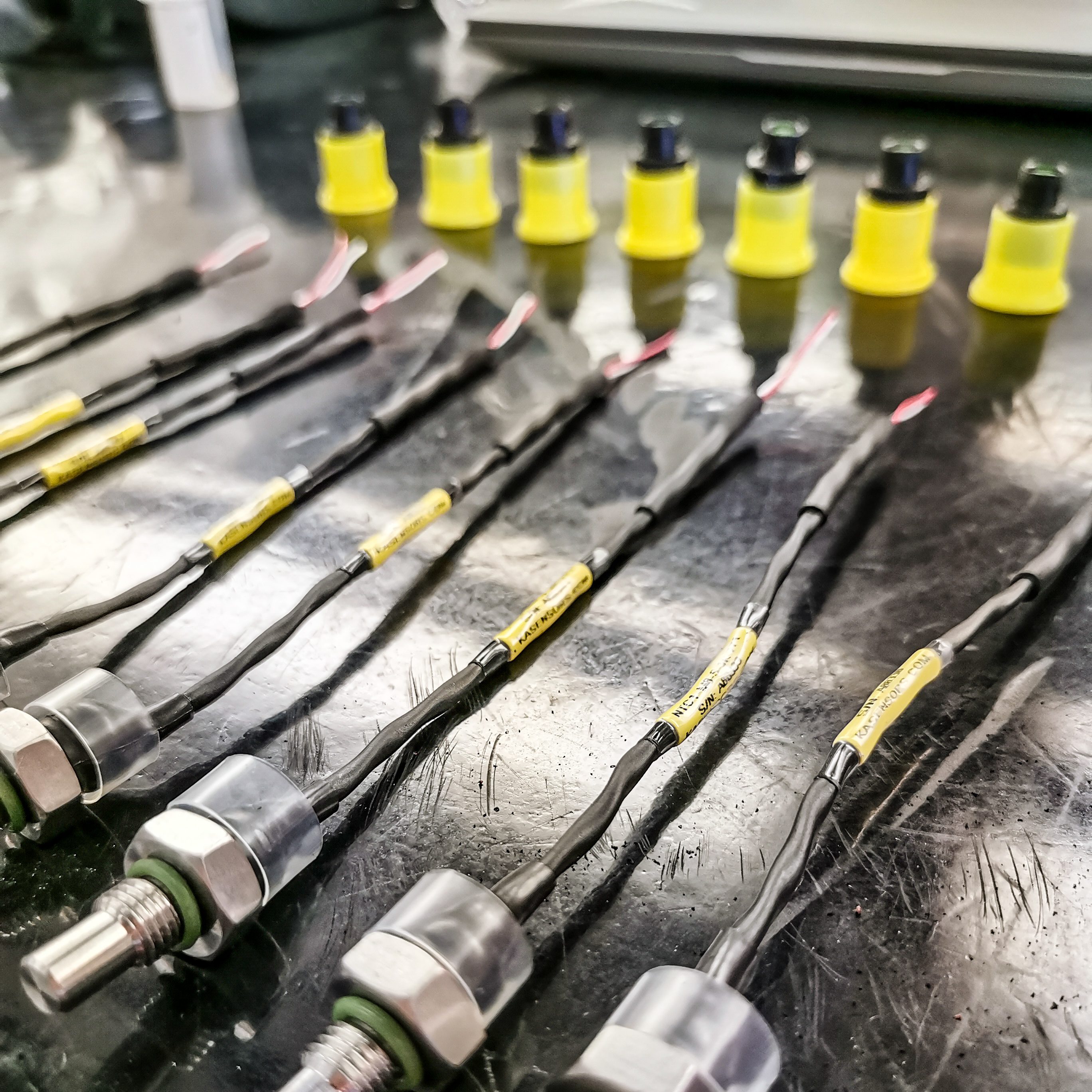 Detailed photograph of a wiring harness designed for use in motorsports.